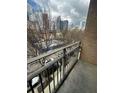 Balcony overlooking cityscape, offering fresh air and city views at 171 Auburn Ave # 329, Atlanta, GA 30303