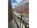 Balcony view showcasing the building's exterior and city street at 171 Auburn Ave # 329, Atlanta, GA 30303