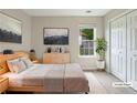 Cozy bedroom with ample natural light, neutral tones, and closet space at 402 Lafayette St, Dallas, GA 30157