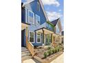 Inviting exteriors with covered porches and colorful siding in a new construction community at 1095 Tucker Ave # 106, Atlanta, GA 30310