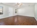 Living room featuring hardwood floors and neutral walls at 4010 Village Run Dr, Mcdonough, GA 30252