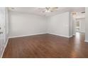 Spacious living room with hardwood floors and ceiling fan at 4010 Village Run Dr, Mcdonough, GA 30252
