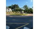 Roundabout entrance to a residential community at 3730 Reserve Overlook (Lot 8) Way, Cumming, GA 30041