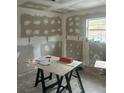 View of a room undergoing renovations; drywall work in progress at 115 Montgomery St, Atlanta, GA 30317