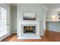 Living room fireplace with white mantel and marble hearth at 955 Juniper Ne St # 2324, Atlanta, GA 30309