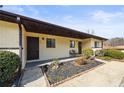 Neat and inviting condo exterior, showcasing a covered entryway at 803 New Horizon St, Powder Springs, GA 30127