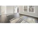 Bright living room featuring dark hardwood floors at 279 Lewis Way, Canton, GA 30115