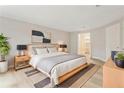 Comfortable bedroom featuring modern decor, a spacious closet, and natural light at 4315 Orchard Park Ct, Stone Mountain, GA 30083