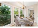 Bright breakfast nook with large windows offering serene views at 4315 Orchard Park Ct, Stone Mountain, GA 30083