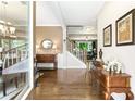 Bright and spacious entryway with hardwood floors and charming decor at 138 Stargaze Rdg, Canton, GA 30114