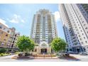 High rise building with fountain and landscaping at 799 Hammond Dr # 406, Atlanta, GA 30328
