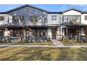 Charming townhomes with stylish trim, covered entryways, and professionally landscaped lawns at 945 Willingham Dr # 3, Hapeville, GA 30354