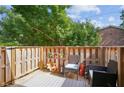 Private deck with wooden fence and seating area at 5558 Kingsport Dr # 27, Atlanta, GA 30342