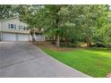 Two-car garage and covered porch on this charming home at 204 Wesley Mill Ln, Villa Rica, GA 30180