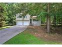 Ranch home with two-car garage and covered porch at 204 Wesley Mill Ln, Villa Rica, GA 30180