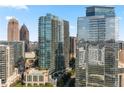 Aerial perspective of a modern high-rise building with city views and pool at 1080 Peachtree Ne St # 1309, Atlanta, GA 30309