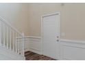 Welcoming entryway features pristine white trim, fresh paint, and sleek, modern flooring at 1623 Bradmere Ln, Lithia Springs, GA 30122