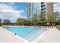 Resort-style pool with plenty of lounge chairs and high-rise views at 3300 Windy Ridge Se Pkwy # 813, Atlanta, GA 30339