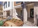 Charming brick front porch offering a warm welcome to this beautiful home at 352 Olmstead Way # 28, Alpharetta, GA 30022
