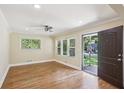 Bright, open space with hardwood floors, neutral walls, and a back porch entrance at 2121 Arlington Ne Ave, Atlanta, GA 30324