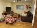Comfortable living room with hardwood floors, colorful decor, and natural light at 2121 Arlington Ne Ave, Atlanta, GA 30324