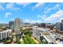Panoramic city skyline view on a sunny day with blue skies and scattered clouds at 1065 Peachtree Ne St # 3003, Atlanta, GA 30309