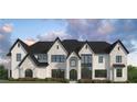 Elegant home with a stone and siding exterior, multiple windows, and a meticulously maintained lawn at 2013 Old Atlanta Rd, Cumming, GA 30041