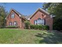 Attractive brick home with well-manicured lawn at 710 Stonehenge Pl, Jonesboro, GA 30236
