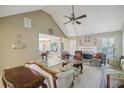 Spacious living room with vaulted ceilings and a fireplace at 710 Stonehenge Pl, Jonesboro, GA 30236