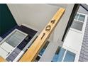 Close up of 401 exterior architectural detail with wood post accent and trim at 1095 Tucker Ave # 401, Atlanta, GA 30310