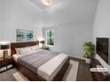 Relaxing main bedroom featuring a comfortable bed, soft lighting, and ample space at 3227 Diamond Blf, Union City, GA 30291
