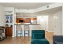 Open kitchen with granite countertops and stainless steel appliances at 390 17Th Nw St # 1063, Atlanta, GA 30363