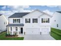 Two-story house with white siding, gray roof, and a two-car garage at 608 Kimberwick Dr, Locust Grove, GA 30248