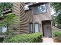 Exterior view of 2 story townhome with landscaping at 102 Cedar Chase Rd, Atlanta, GA 30324