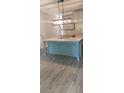 Modern kitchen features a large island, light gray cabinets, and stainless steel appliances at 6206 Ripple Way # 89, South Fulton, GA 30349