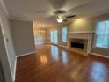 View of the living room showing hardwood floors and fireplace at 2198 Vinings North Se Ln, Smyrna, GA 30080