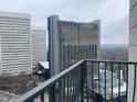 Balcony view overlooking The Starling hotel and city landscape at 195 14Th Ne St # 2103, Atlanta, GA 30309