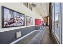 Modern hallway with large windows and artwork at 330 Peters Sw St # 210, Atlanta, GA 30313