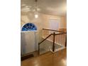 Bright foyer with hardwood floors and an arched entryway at 6922 Magnolia Park Dr, Norcross, GA 30093