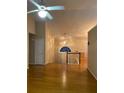Spacious living room with hardwood floors and a view of the foyer at 6922 Magnolia Park Dr, Norcross, GA 30093