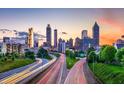 Atlanta skyline view at sunset featuring modern buildings and active roadways at 898 Oak Sw St # 3108, Atlanta, GA 30310