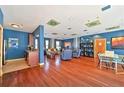 Open floor plan living room with hardwood floors and large windows for ample natural light at 898 Oak Sw St # 3108, Atlanta, GA 30310
