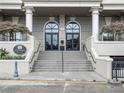 Grand building entrance with classic architectural design and inviting stairs at 3334 Peachtree Ne Rd # 1707, Atlanta, GA 30326
