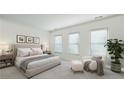 Cozy bedroom with a plush bed, sitting chair, and ample natural light at 2500 Peachtree Nw Rd # 405S, Atlanta, GA 30305