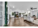 Inviting open-concept living room features hardwood floors, fireplace, and seamlessly connects to the kitchen at 2228 Old Dallas Sw Rd, Marietta, GA 30064