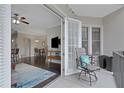 Cozy balcony extends the living space with outdoor seating, connecting to the interior living and dining areas at 3621 Vinings Slope Se # 3411, Atlanta, GA 30339