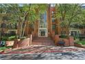 Brick building exterior with landscaping and a welcoming entrance at 27303 Plantation Ne Dr, Atlanta, GA 30324