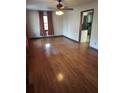 Spacious living room with hardwood floors and a ceiling fan at 5094 Mable Lake Sw Dr, Mableton, GA 30126