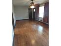 Hardwood floors and lots of natural light in this living room at 5094 Mable Lake Sw Dr, Mableton, GA 30126