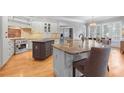 Spacious kitchen featuring granite counters and island at 5040 Harrington Rd, Johns Creek, GA 30022